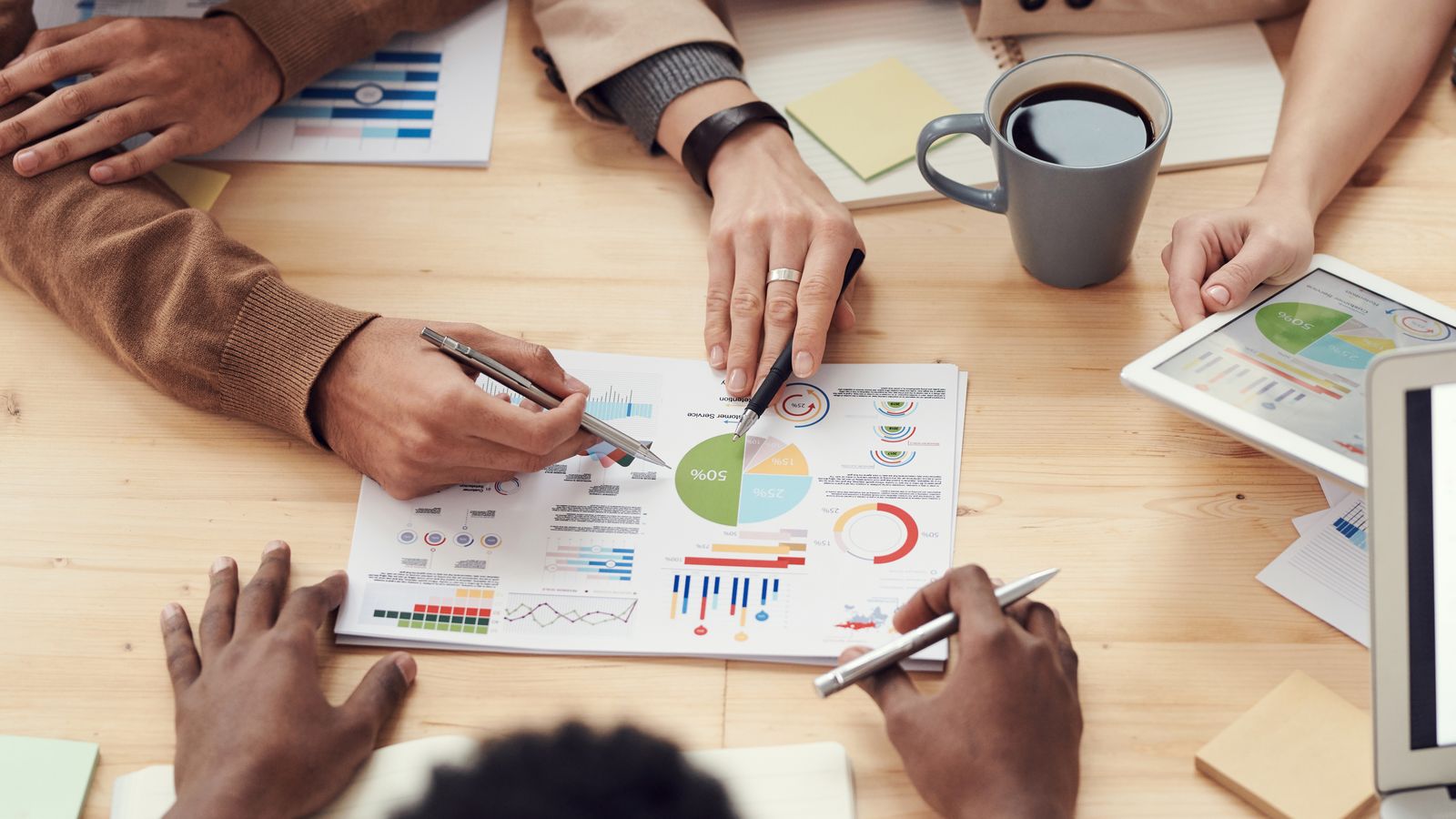 Advisors reviewing an investment portfolio together